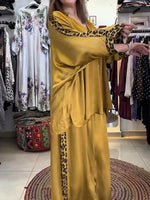 Loose And Comfortable Two-piece Set Featuring A Lightweight Satin Shirt And Trousers With Leopard-print Panels.