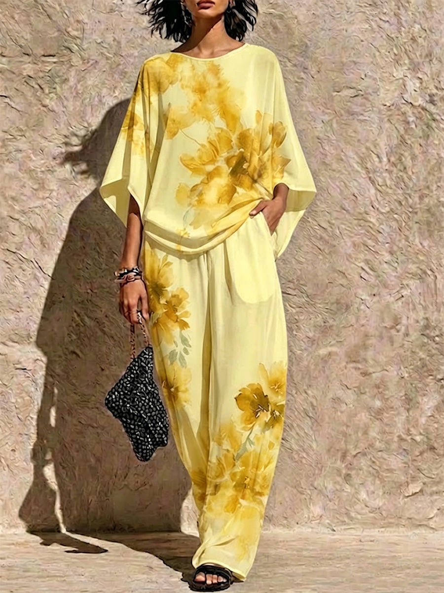 Two-piece Set Featuring A Loose, Batwing-sleeve Top With A Watercolor Floral Print And Wide-leg Trousers
