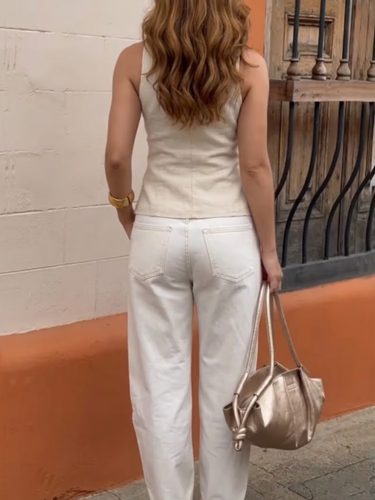 Casual Two-piece Set Featuring A Sleeveless Cotton Vest With Metal Buckles And Cotton Trousers.