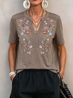 Short-sleeve Cotton Top With Colorful Floral Embroidery, Lace Trim, And A Small Open V-neck