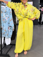 Two-piece Set Featuring A Loose, Casual Floral-print Linen-cotton Shirt And Solid-colored Trousers.