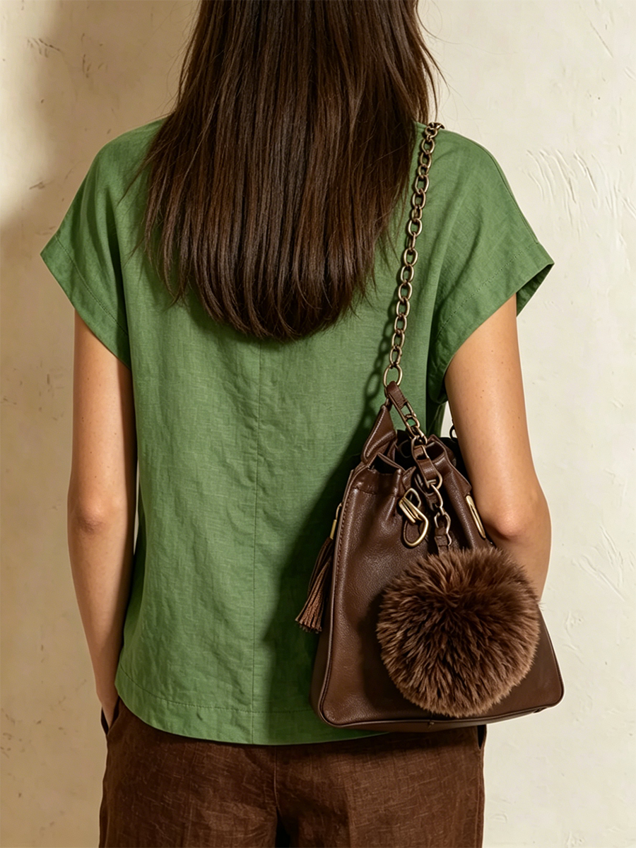 Cotton-linen Top Featuring A Round Neck, Diagonal Button Closure, Overlapping Asymmetrical Hem, And Cap Sleeves