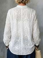 Bohemian-style Linen Shirt Featuring 3d Floral Embroidery, A Stand Collar, And Long Sleeves With Roll-up Functionality—a Casual Top