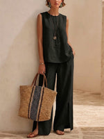 Minimalist, Relaxed-fit Textured Sleeveless Top With Partial Button Placket And Matching Draped, Side-slit Wide-leg Trousers Set