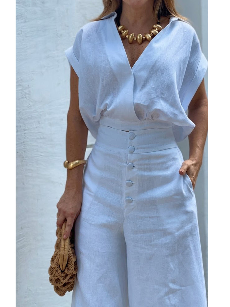 Two-piece Set Featuring A Stylish Cropped Linen-cotton Top And High-waisted Wide-leg Trousers.
