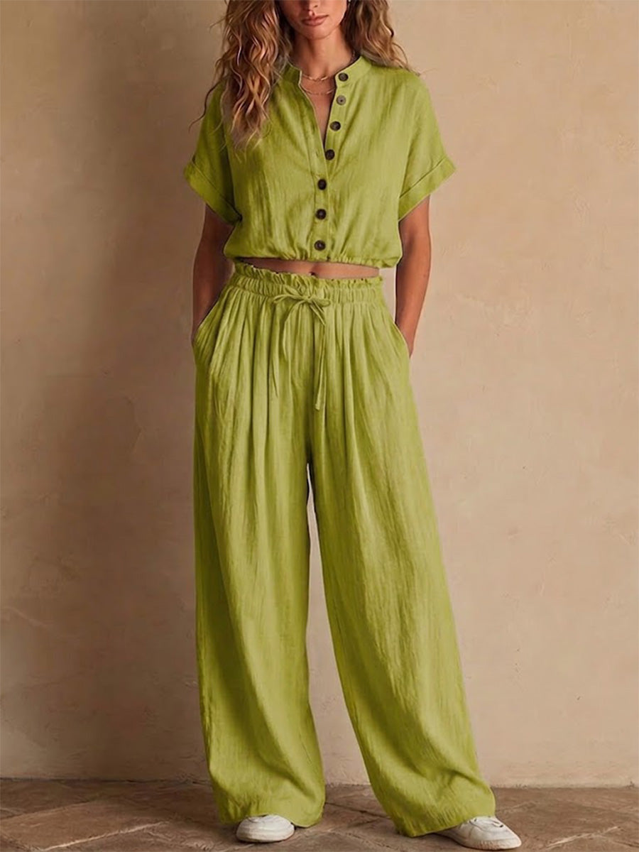 Two-piece Linen Set Featuring A Cropped, Half-button Top With A Stand Collar, Wooden Buttons, And Roll-up Sleeves, Paired With Wide-leg Trousers Featuring An Elastic Drawstring Waist