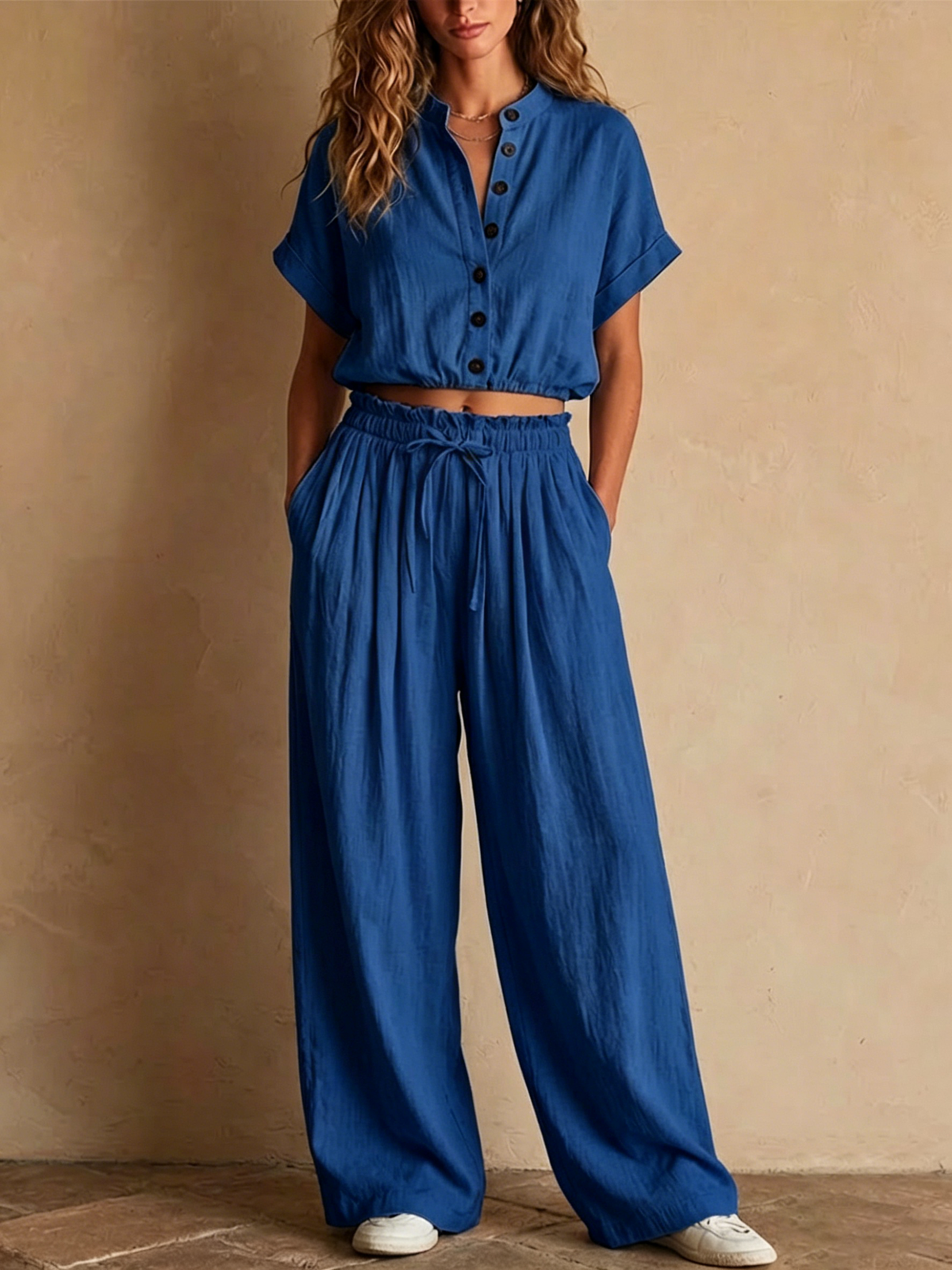 Two-piece Linen Set Featuring A Cropped, Half-button Top With A Stand Collar, Wooden Buttons, And Roll-up Sleeves, Paired With Wide-leg Trousers Featuring An Elastic Drawstring Waist