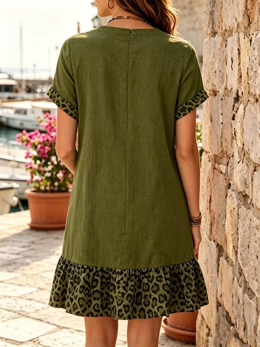 Loose-fit, Cropped Dress Featuring A V-neck, Rolled-cuff Short Sleeves, A Leopard-print Patch Pocket, And A Ruffled Hem