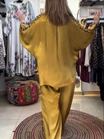 Loose And Comfortable Two-piece Set Featuring A Lightweight Satin Shirt And Trousers With Leopard-print Panels.