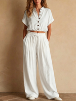 Two-piece Linen Set Featuring A Cropped, Half-button Top With A Stand Collar, Wooden Buttons, And Roll-up Sleeves, Paired With Wide-leg Trousers Featuring An Elastic Drawstring Waist